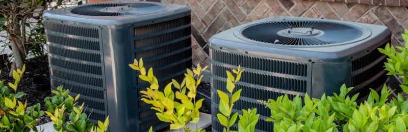 HVAC technician performing AC repair service in Bonsall CA home